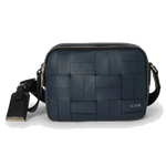 TUMI's Harrison Winsor Navy Woven Crossbody Bag is made with nylon and has a textured surface.