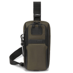 This TUMI Alpha 3 Compact Sling Bag Olive Night has an adjustable strap and a leather luggage tag.