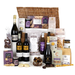 The Ultimate Hamper by Wheelers Luxury Hampers with a range of sweet treats, savoury and bottles of bubbly.