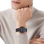 This 1858 GMT Black Rubber Watch is designed by Montblanc.