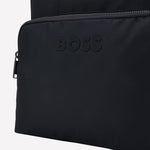 This Navy BOSS Catch 3.0 backpack comes with the logo attached to the front of the zipped pocket.