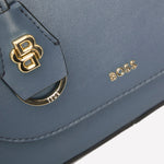 BOSS Numah light blue ross body bag comes with the brand name on the front and a logo key fob.