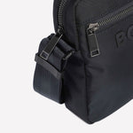 BOSS Catch 3.0 Cross Body Bag comes with branded zips on the front and top.