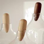 LSA's Signature Float Decanter with Oak Stopper features a slim neck.