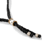 This Paul Smith Men's Black Oval Link Bracelet is made with a polyester cord and silver 925 charm.