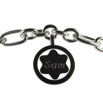 The pendant on this Montblanc bracelet has been engraved.