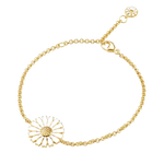 This Georg Jensen White Enamel Gold-Plated Daisy Bracelet is adjustable due to the chain links and is great for wearing on its own or layered with other bracelets.