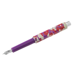 This Montegrappa Gnomo Obsession Midnight Purple Fountain Pen is made out of resin with a purple barrel and a patterned cap in red, purple, and cream.
