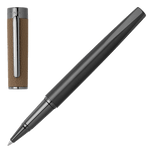 This Hugo Boss Corium Chrome Rollerball Pen Camel has a gunmetal exterior that is made with brass.