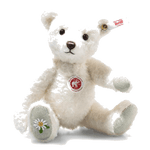 Steiff's Elena the Teddy Bear, 19 cm is ready for Spring and has an embroidered daisy design on her paw.