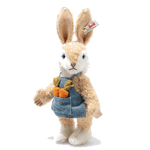 This Steiff Carrie the Rabbit, Limited Edition has two carrots inside her front pocket with blue eyes and the gold button in ear.