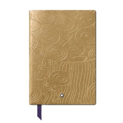This Montblanc Masters of Art Gustav Klimt #146 Lined Notebook is made out of leather with a patterned surface and a blue ribbon bookmark.