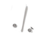 Spider stell cufflink presented on a white shirt by Montblanc.