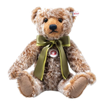 Steiff's British Collectors' 2025 Teddy Bear is made out of a blend of mohair and cotton and has safety eyes and the gold-plated button in ear.