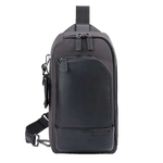 This TUMI leather and canvas sling bag features the brand name embossed on the front.