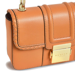 This Hanley Close Apricot Mini Flap Over Bag by Radley has a front lock clasp in gold hardware with the Radley brand name engraved.