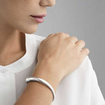 This Georg Jensen Sterling Silver Offspring Open Bangle comes in many different sizes.