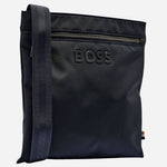 This BOSS Catch 3.0 envelope bag comes in a dark navy colour and comes with an adjustable shoulder strap.