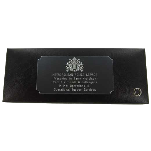 This Montblanc pen has had a plaque engraving placed on the top for a service award.