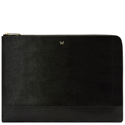 This Black 'W' Laptop Sleeve is designed by WOLF 1834.