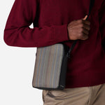 The Paul Smith Signature Stripe Coated Canvas Flight Bag by Paul Smith.