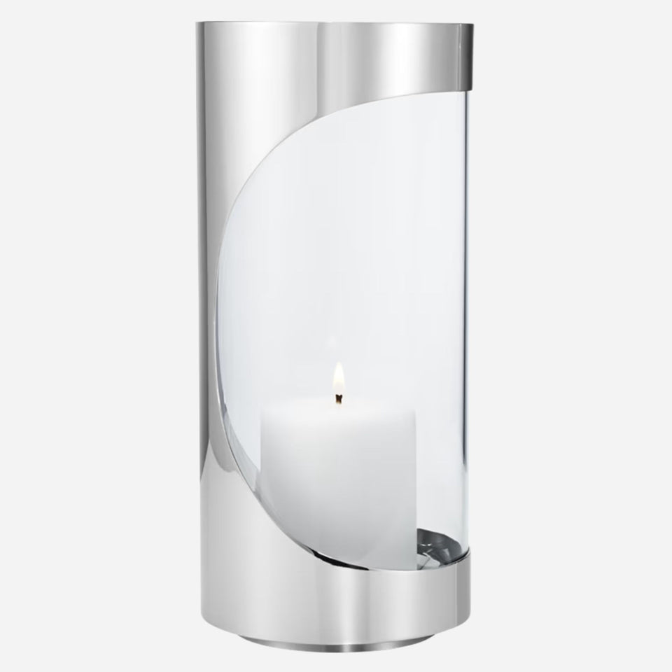 The Chrome Contours Medium Stainless Steel and Glass Hurricane Candleholder by Georg Jensen.
