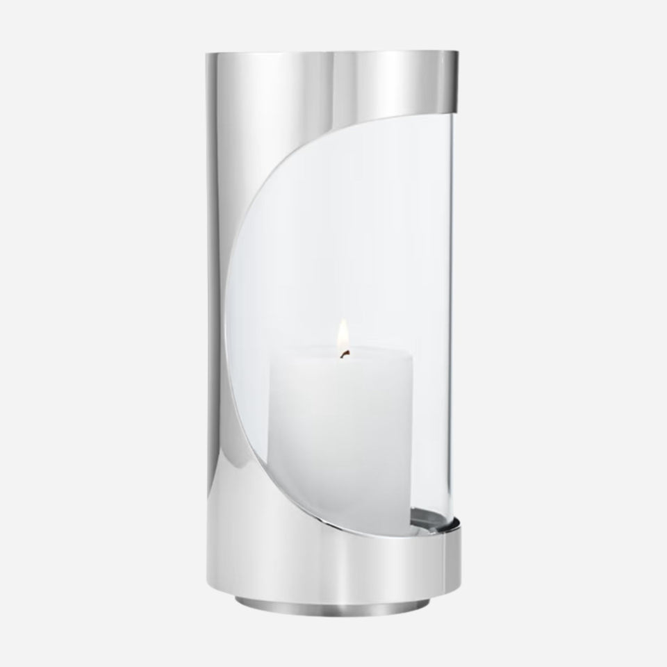 The Chrome Contours Small Stainless Steel and Glass Hurricane Candleholder by Georg Jensen.