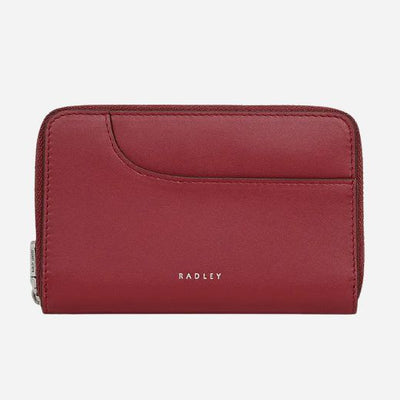 The Pockets Carmine Leather Medium Zip Around Purse by Radley.