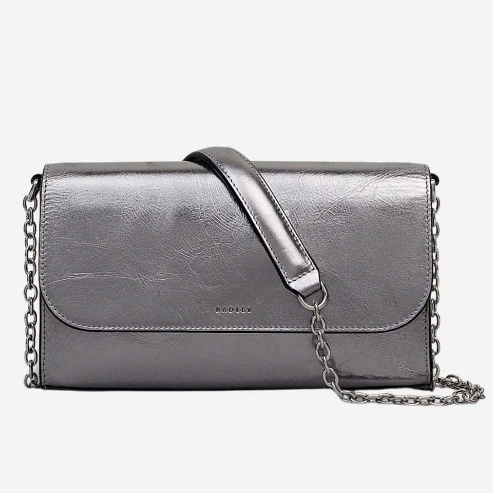The The Rathbone Silver Micro Flapover Cross Body Bag by Radley.