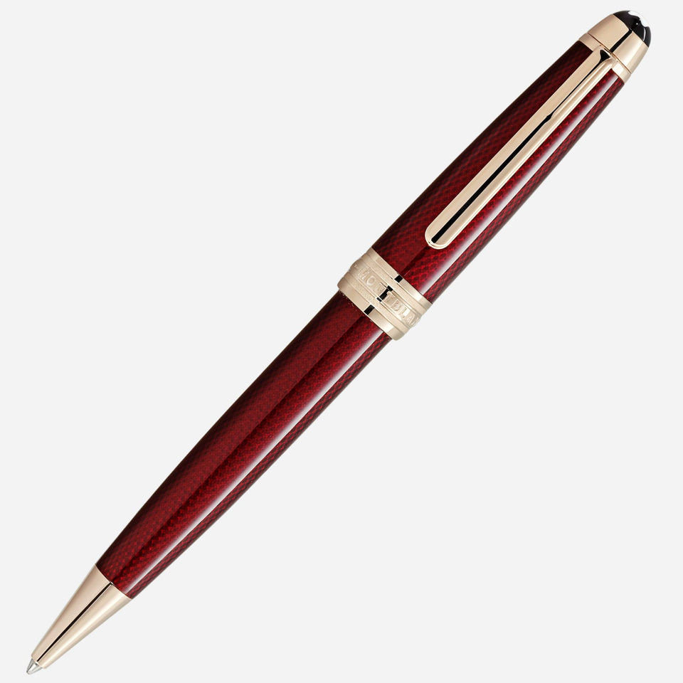 The Burgundy Red Meisterstück Solitaire Golden Hour Midsize Ballpoint Pen by Montblanc.
