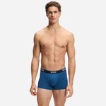 The blue pair from the BOSS 3-Pack of Blue Power Cotton Stretch Trunks with Logo Waistband.