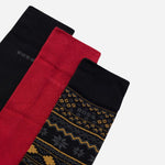 The cuffs of the 3 Pairs of Socks Winter Gift Set in Red, Black, and Fair Isle.