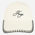 Front view of the BOSS Ally Cream Cotton-Twill Cap with Embroidered Edges and Hugo Logo.