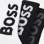 Close up of the BOSS Pack of 3 White & Black Quarter Length Cotton Blend Socks with Large Logos.