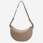 Back view of the Beyond Halfmoon Beige Leather Cross Body Bag.