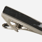 Close up view of the Brass Tie Clip with Black and White Marble Insert.