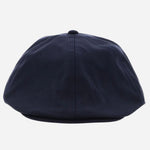 Front view of the BOSS Navy Blue Trystan Techwool Flat Cap.