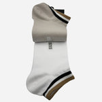 The white pair from the BOSS Pack of 2 Cotton Ankle Socks With Signature Stripe Cuffs.