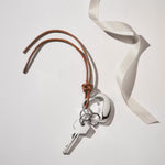 The Stainless Steel and Leather Heart Keyring by Georg Jensen.