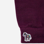 The striped zebra logo on the Men's Red Wool Gloves with Striped Zebra Logo.