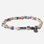 Side view of the Paul Smith White, Blue and Orange Striped Glass Bead Bracelet.