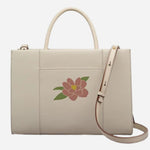 Back view of the Radley Spring Blooms Raffia and Leather Medium Ziptop Multiway Bag.