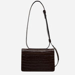 Back view of The Belsize Dark Oak Faux Croc Leather Small Flapover Shoulder Bag.