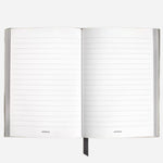 Inside the Montblanc Fine Stationery Medium Velvet Green Sartorial Leather Notebook with Lined Pages.