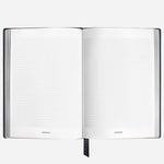 Inside the Fine Stationery Medium Ink Blue Sartorial Leather Notebook with Squared Pages.