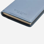 The base of the Yard-O-Led Sky Blue Mordan Refillable Leather Notebook.