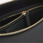 Inside the Beyond Halfmoon Black Leather Cross Body Bag.