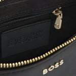 Inside the Black Leather Numah Minibag with Double 'B' Monogram Charm.