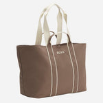 Side view of the Brown and Cream Palmah Tote with Logo Straps.