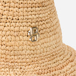 Close up of the BOSS Danika CR Beige and Brown Woven Hat with Metal Logo.